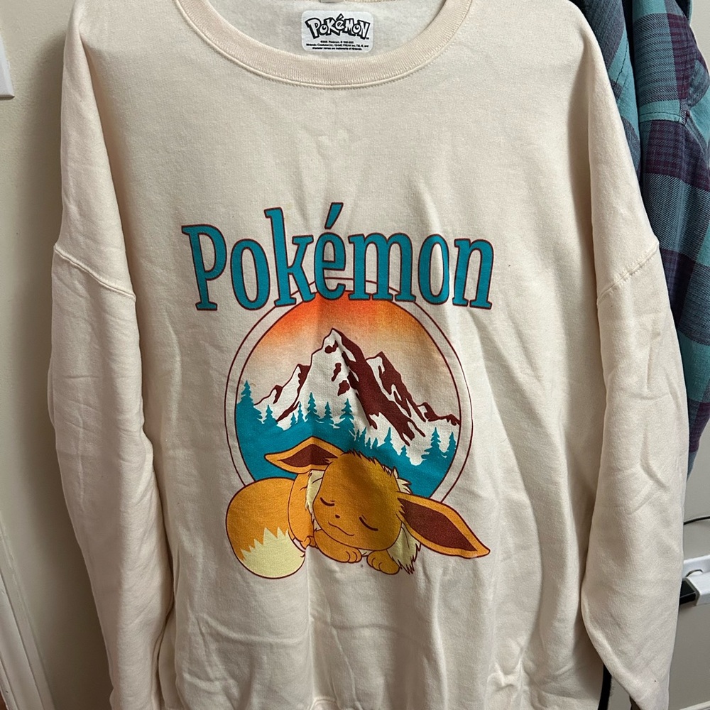 Cream Pokémon Sweatshirt with Eevee Graphic